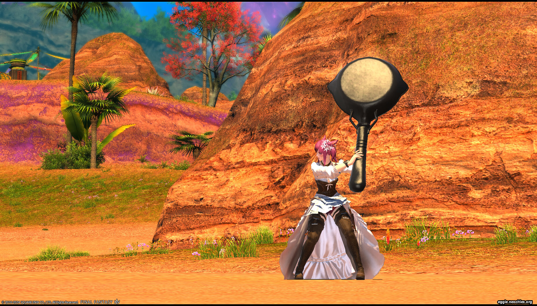 Zel holding a gigantic iron skillet like it is a baseball bat. The skillet is as tall as she is (roughly five feet long).