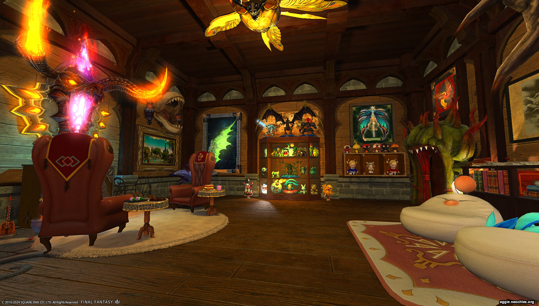 A shot of the inside of Zel's house, the Clan Nutsy Hunters' Lodge. There is a lot of furniture crafted from monsters and primals, as well as a showcase full of dolls and figurines.