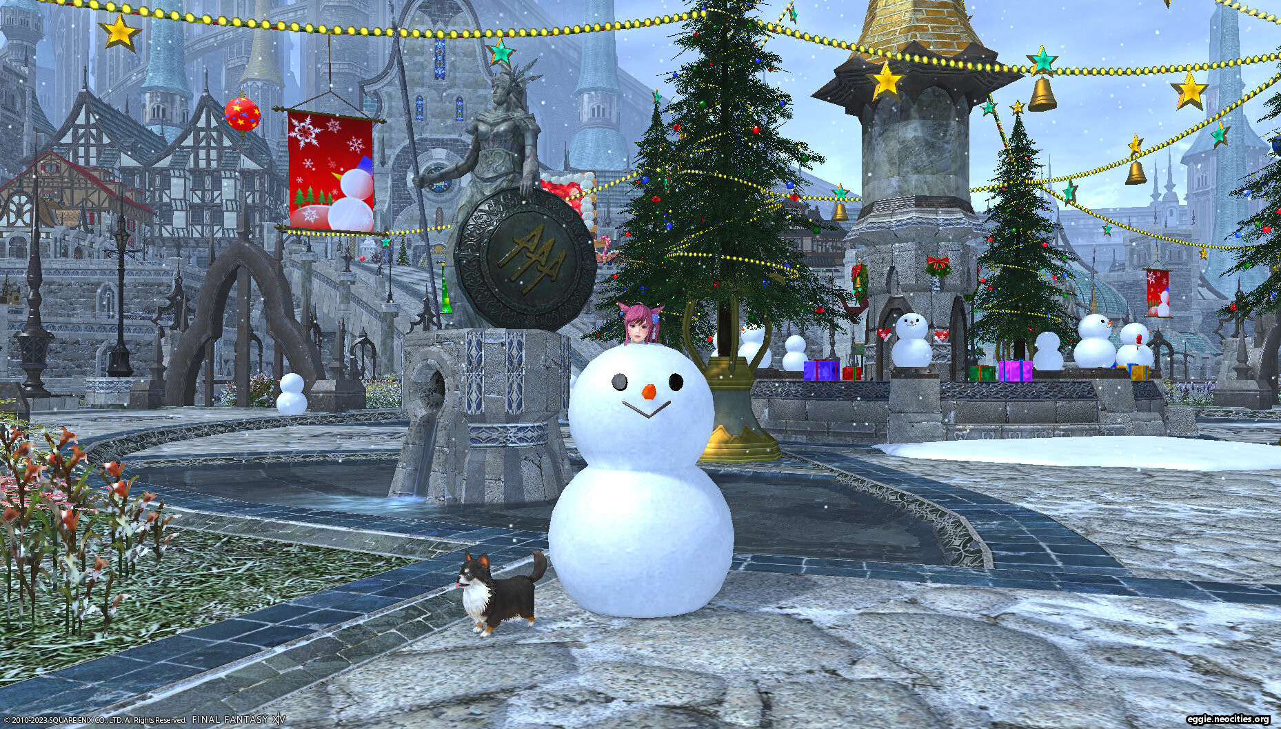 Zel standing inside of a snowman, with just her head poking through the top.
