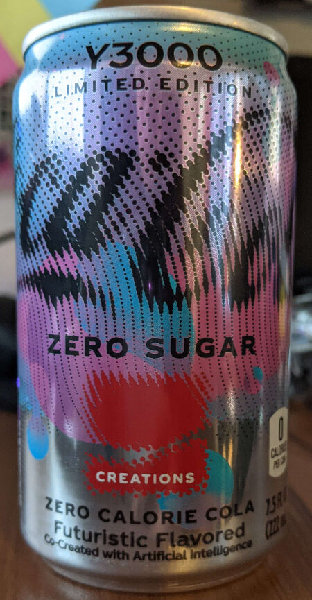 A Mini (7.5 oz) can of Coca-cola Y3000 flavor. The can has blue and pink gradients with black dots overlayed. The text on the can reads Y3000 Limited Edition, coca-cola Zero Sugar, on the bottom the text reads Creations, Zero Calorie cola, Futuristic Flavored, Co-created with Artificial Intelligence.